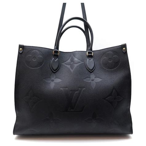 borsa louis vuitton nera con scritte argento|Borse da donna .